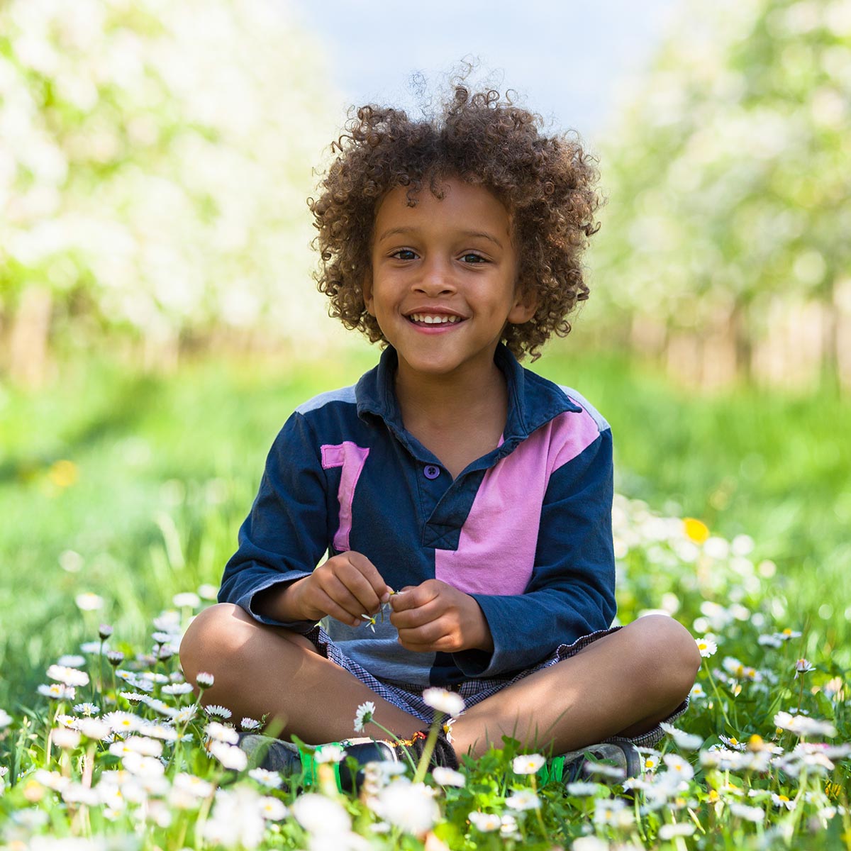 Cute african american little boy playing outdoor